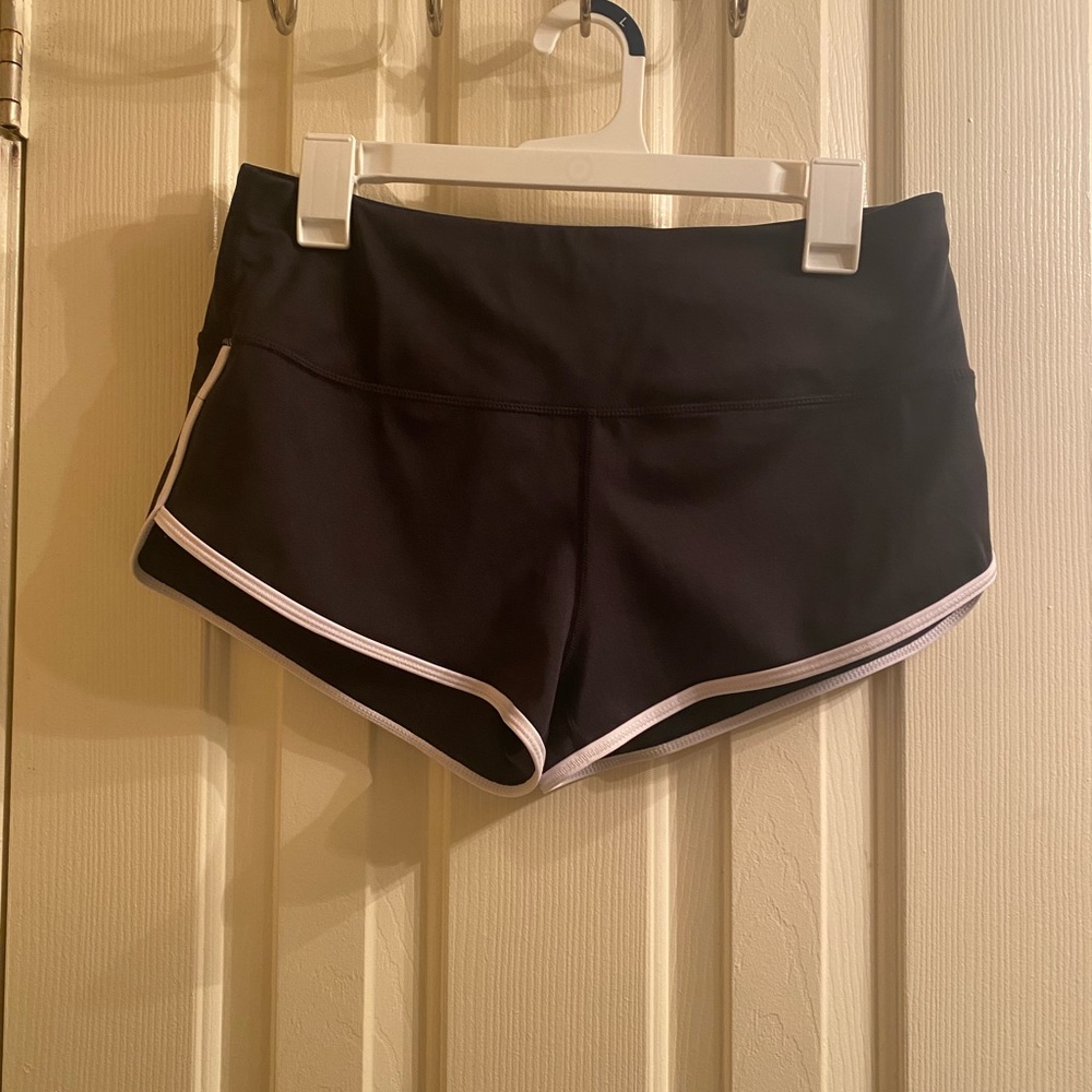 2 pairs of black with white trimming size large workout shorts